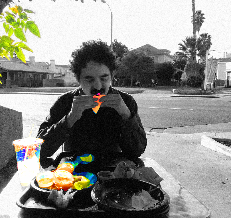 Man eating tacos